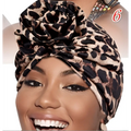 A stylish leopard-print vibrant printed headband elastic with soft flowing fabric and elegant twisted design in a 6 pack set