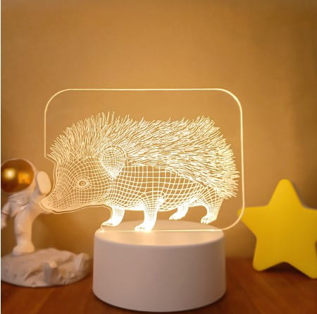 A white cylindrical led nightlight with a glowing 3d wireframe hedgehog design featuring colorful touch remote control lights.