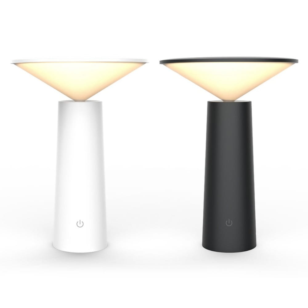 Two minimalist touch table lamps with sleek cylindrical bases in white and black feature softly glowing conical shades and usb led functionality for led reading.