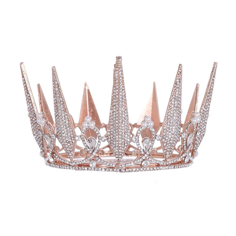 A rose gold crystal big crown wedding tiara adorned with sparkling rhinestones and delicate pearl accents.