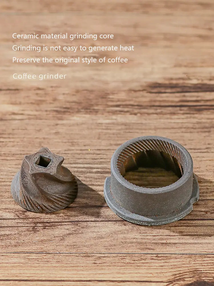 Gray electric ceramic coffee grinder components featuring a textured star-shaped top and a cylindrical base with internal grinding teeth for a portable electric ceramic coffee grinder usb charging.