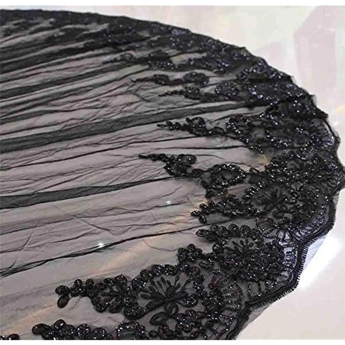Black lace wedding veil with intricate floral embroidery and beading along the edge designed as photography accessories halloween and suitable for traveling photo photography.