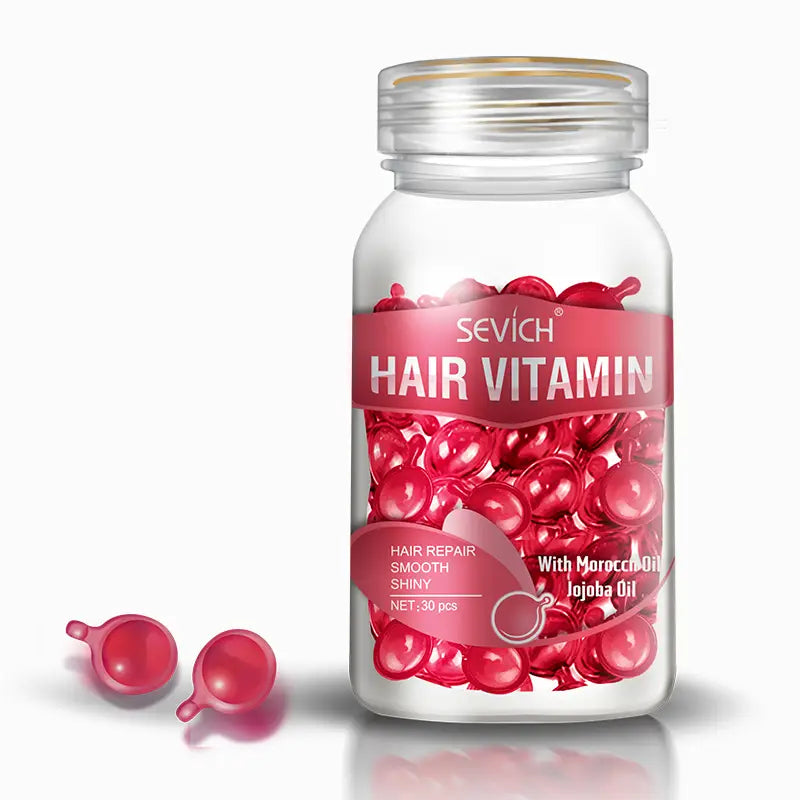 A clear glass bottle of sevich hair care capsules containing red glossy capsules with a gold-rimmed cap for multicolor hair care and diverse benefits.