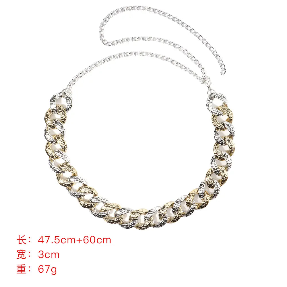 a two tone metallic chain belt featuring alternating silver and gold links each with a central pearl like bead designed as summer body jewelry for jewelry summer body styling.