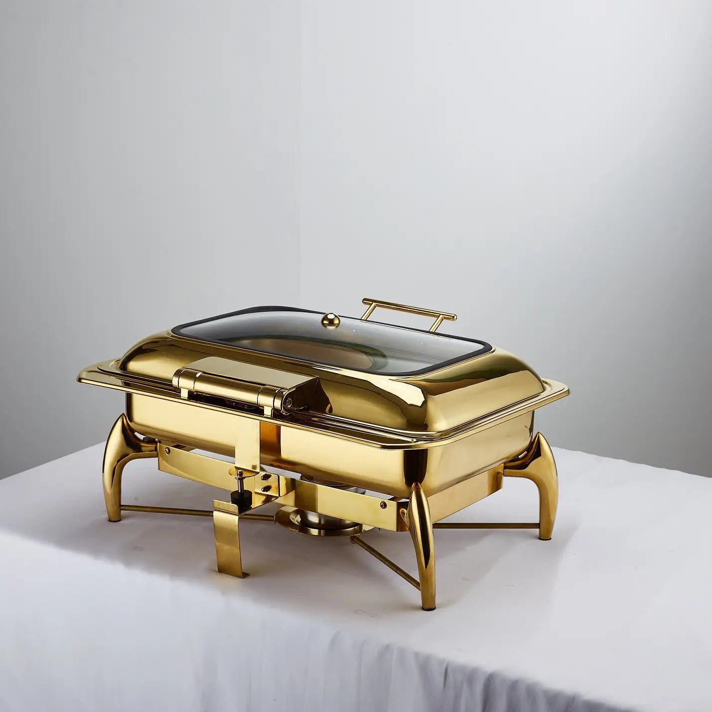 gold stainless steel hotel restaurant bufei buffet stove featuring a golden stainless steel chafing dish with a glass lid and elegant curved legs