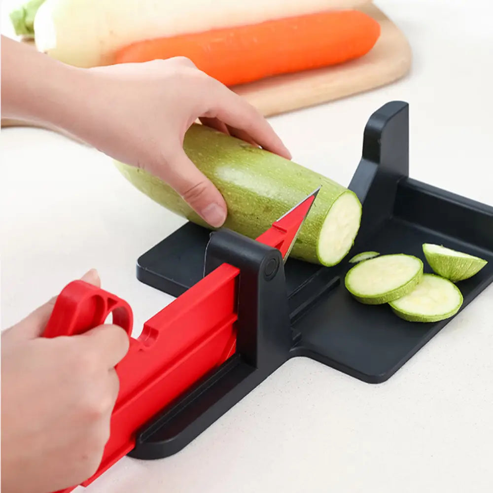 Red and black multifunctional vegetable cutting meat slicer with a sharp blade designed for even vegetable cutting in the kitchen, ideal for slicing zucchini.
