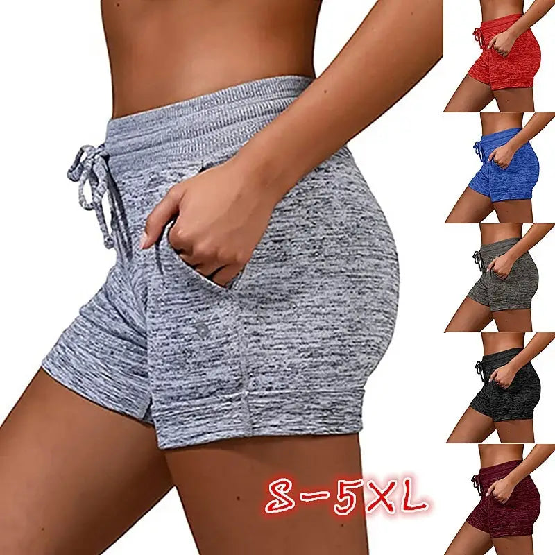 Gray heathered women shorts with stretch sports fabric featuring a drawstring waistband and side pockets for athletic use.