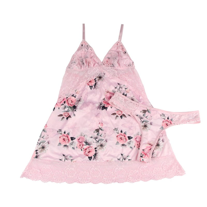 plus size embroidery patchwork lace sleeping dress in soft pink fabric featuring delicate floral lace trim and satin-like material with spaghetti straps.