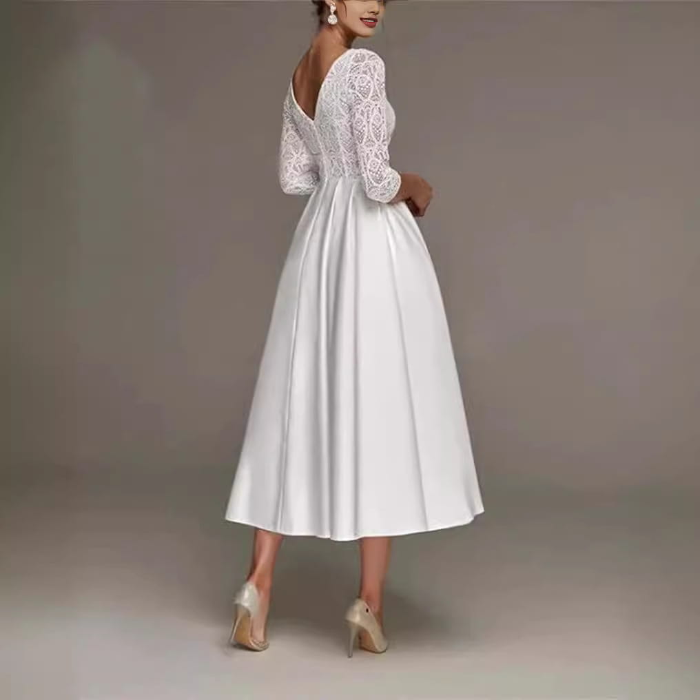 Elegant white bridal deep v-neck long sleeve wedding dress made of lace and satin with three-quarter sleeves and a midi length.