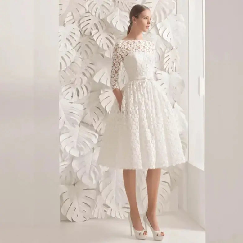 white lace floral wedding dress with ladies small sleeves featuring three-quarter length sleeves and a flared skirt suitable for party ladies small and large size options