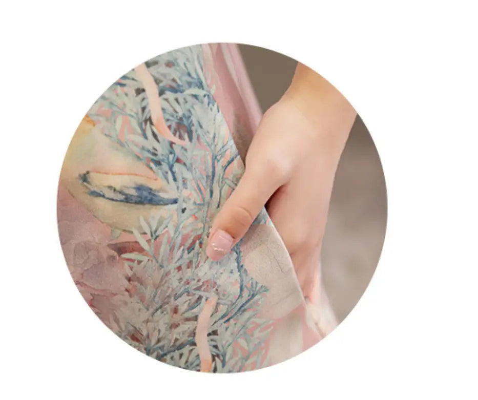 medium length cheongsam floral dress set with jacket featuring delicate sheer fabric with soft pastel pink and blue floral pattern.