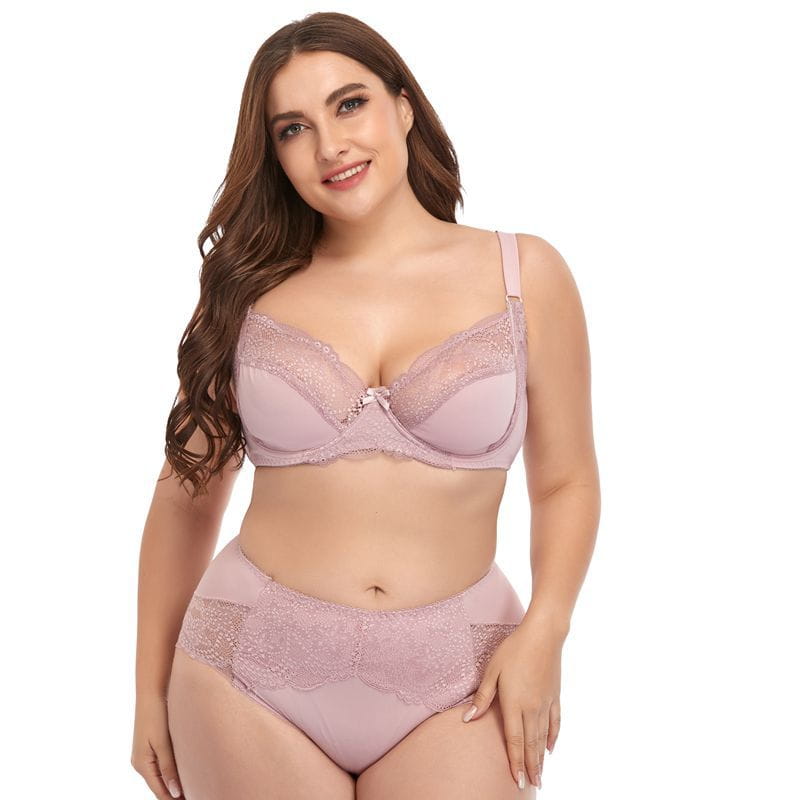 A soft lavender plus size underwire lace trim lingerie set featuring a bra and matching panties made with delicate lace.