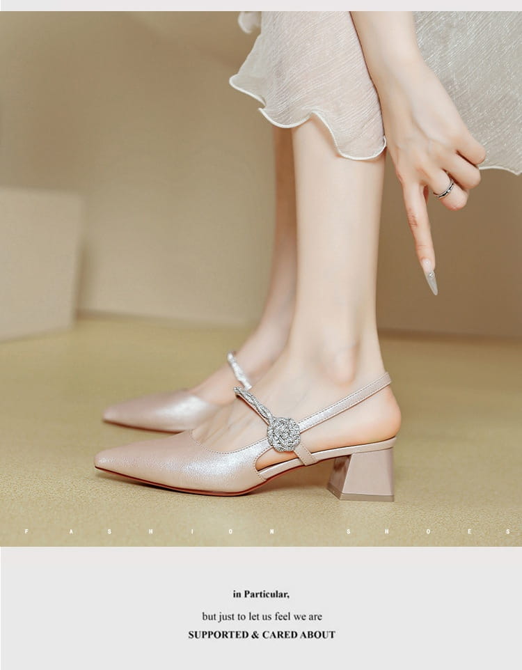 pink leather mules featuring a chunky heel silver buckle and crystal embellishment complementing pointed toe high heels in rose gold satin.