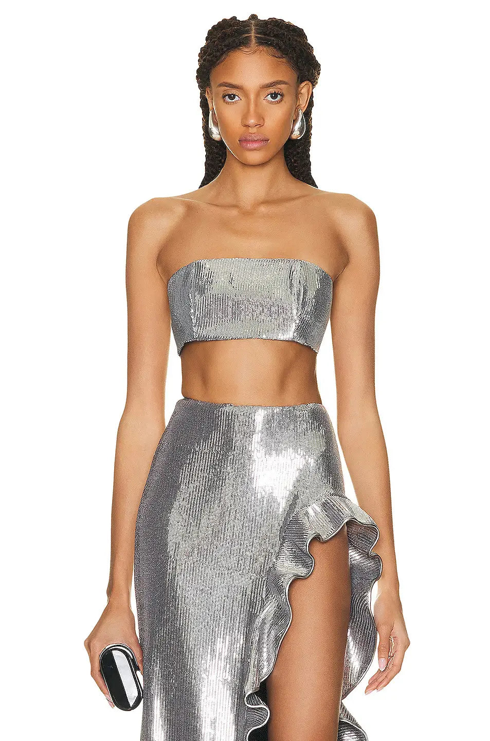 shiny silver metallic strapless crop top with a ruffled hemline as part of a silver strapless sequin skirt set showcasing the sequin skirt set design