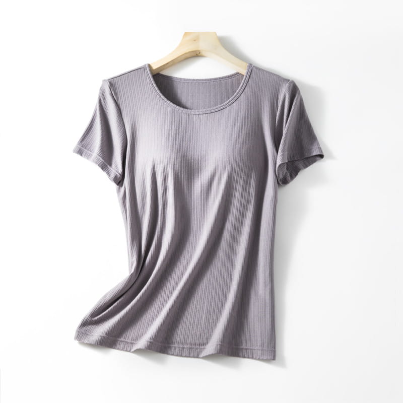 gray ribbed short-sleeved women’s summerdale loose-fitting padded chest top with a round neckline hanging on a wooden hanger