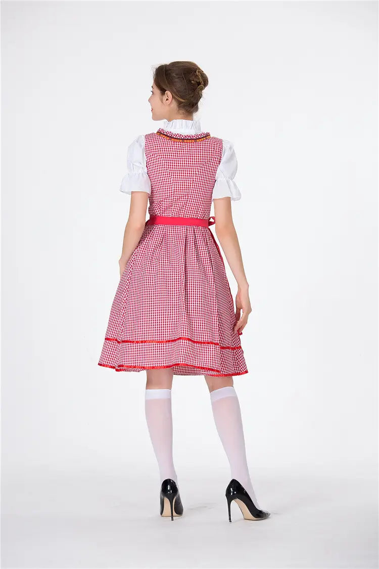 red and white gingham dress with a fitted bodice short puffed sleeves and a flared skirt accented by red trim designed as german beer festival clothing for american german beer celebrations.