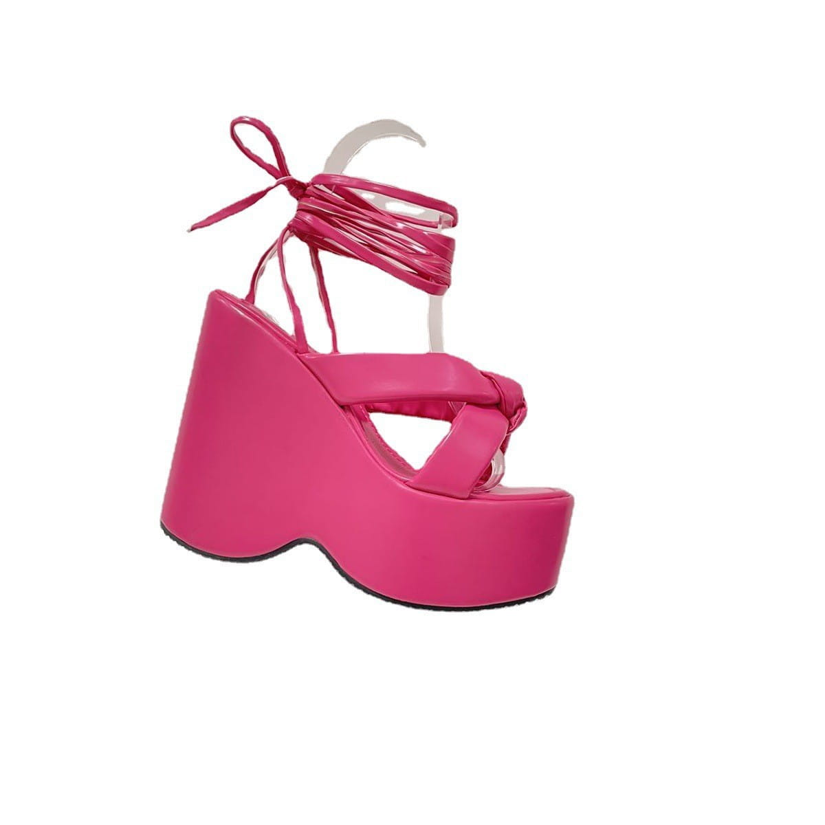 Vibrant pink platform wedge high sandal featuring a thick glossy sole and crisscrossing straps tied at the ankle.