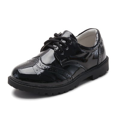 Boys black patent leather shoes with brogue detail featuring a glossy finish and classic lace-up design, ideal as boys leather shoes or british casual single footwear.