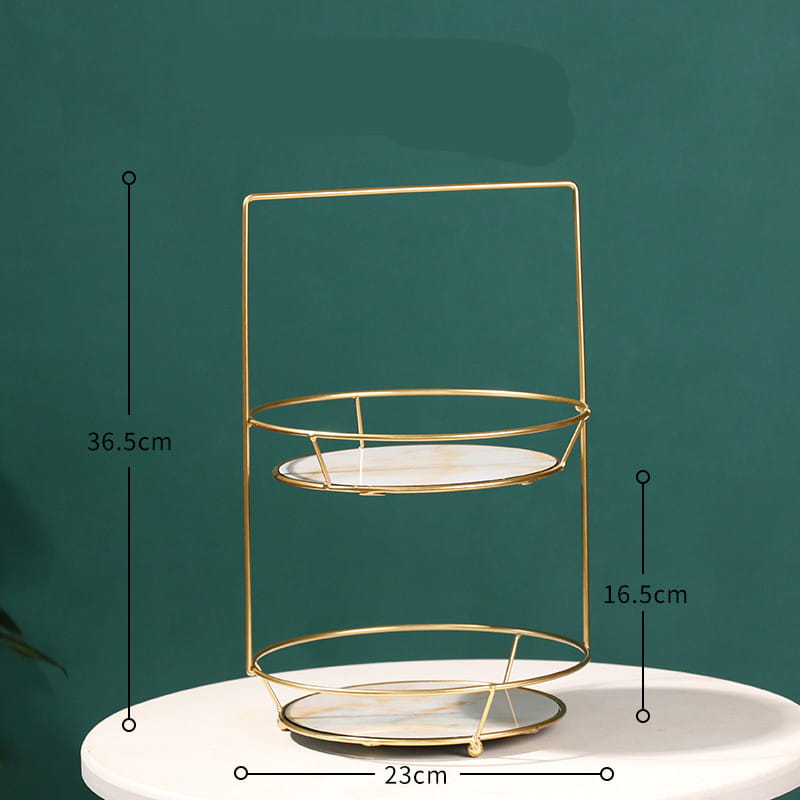 Two tier gold dressing table finishing rack with gold-toned metal frame and clear glass plates from Royale Essence Lux.