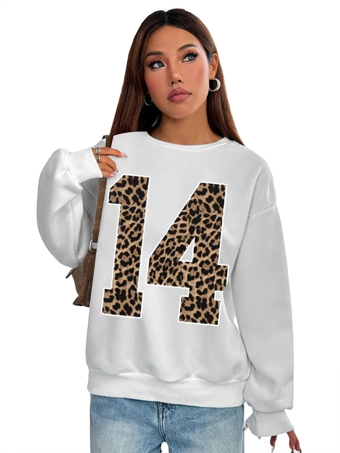 white crew neck sweatshirt featuring a bold black leopard print number 14 on the front in a casual neck sweatshirt design