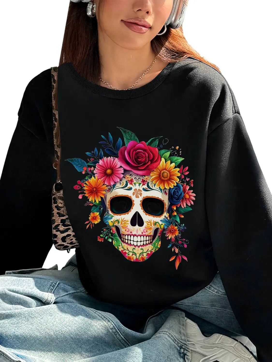 Black long-sleeved crew neck sweatshirt featuring a vibrant colorful sugar skull design adorned with flowers and foliage ideal for daily wear basic long sleeve outfit.