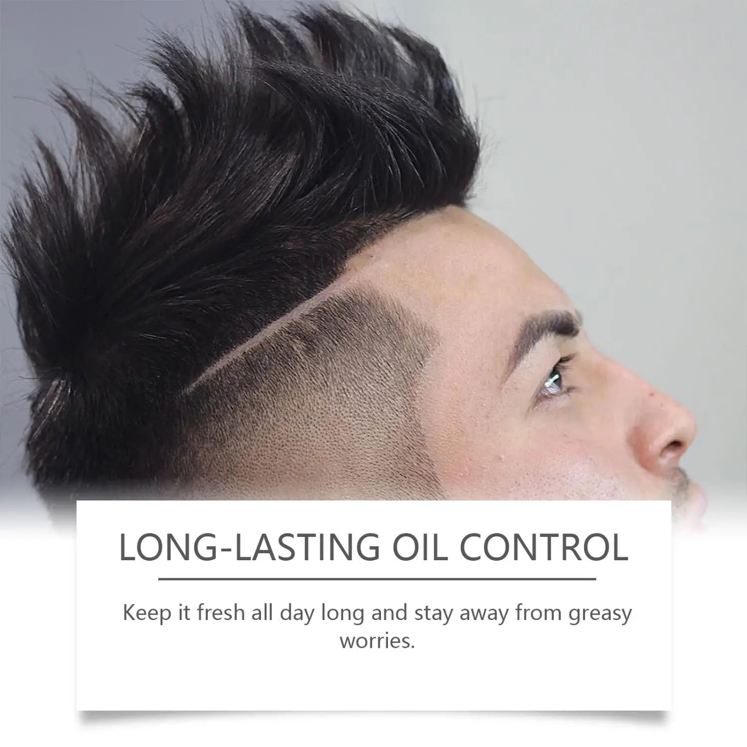 A man with styled black hair featuring a sharp tapered fade and textured top showcasing the men’s hair care shaping wave collection set ideal for hair oil and hair care shaping.