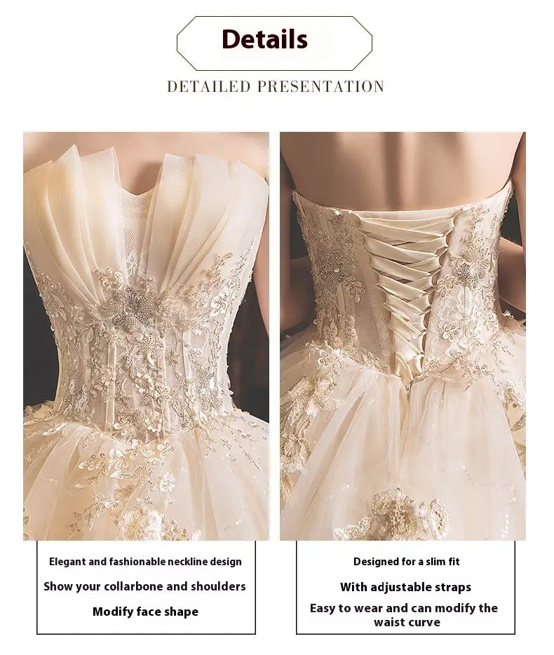 Elegant ivory bride summer tube top mori style trailing skirt wedding gown with intricate lace and beaded floral embroidery and corset-style back with adjustable straps.
