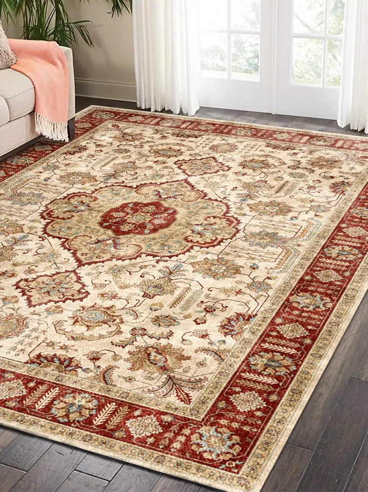 Cream-colored short pile area rug with intricate red and beige floral patterns and a bold red decorative border, ideal for luxury women’s fashion settings and complementing plus size dresses bikinis displays.