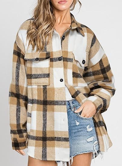 Women’s plaid buckle long sleeve jacket in oversized beige white and dark brown plaid flannel with black buttons.