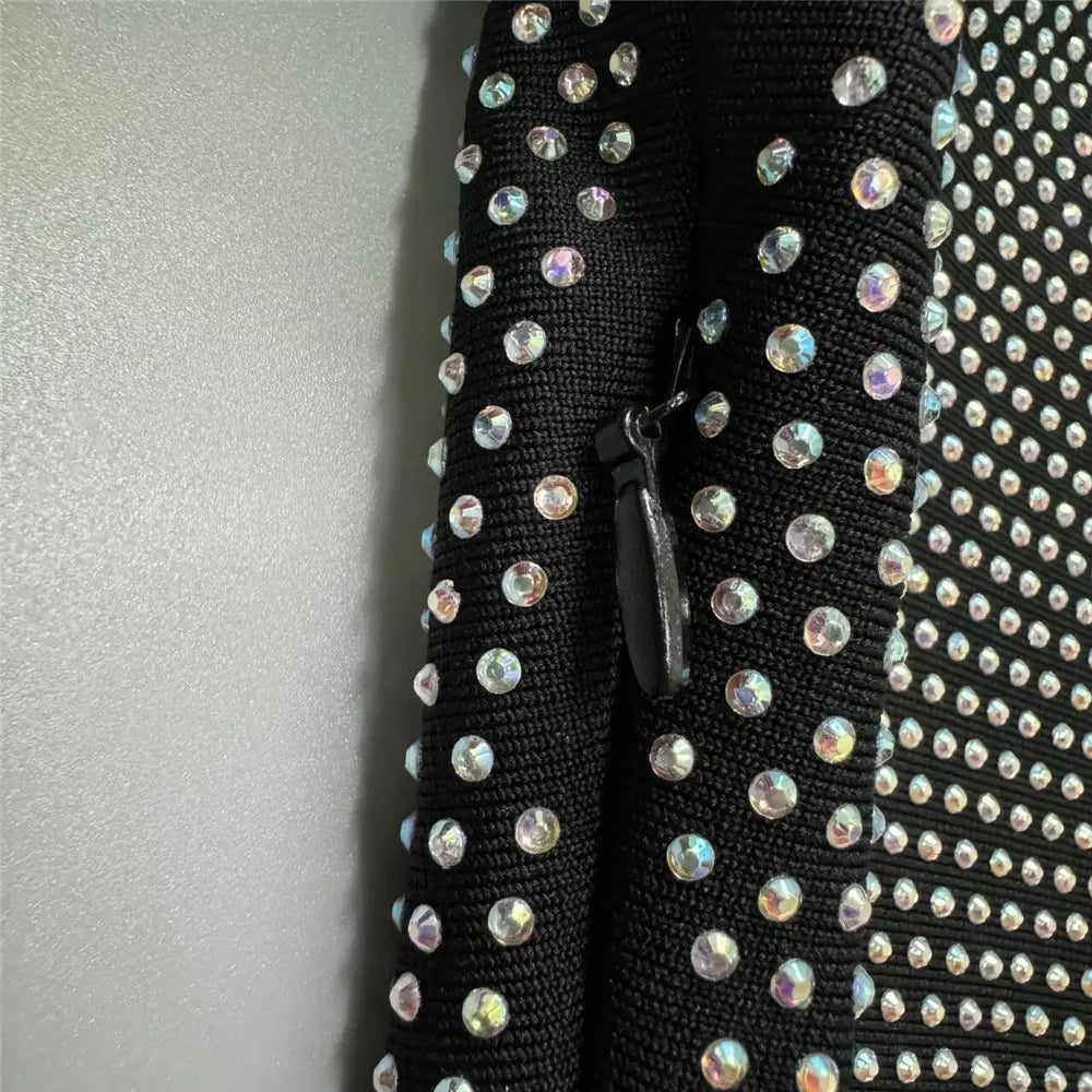 black sexy rhinestone bandage long sleeve mini dress with zipper and iridescent rhinestone embellishments suitable for cross border foreign sales.