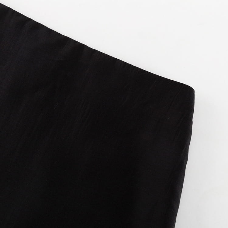 black sheer high waist slit sheath skirt made of black velvet fabric with a smooth slightly textured surface showcasing the waist slit sheath design.
