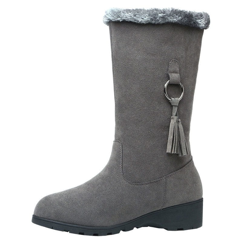 Gray suede martin boots autumn and winter with a long furry gray cuff and tassel detail on the side.