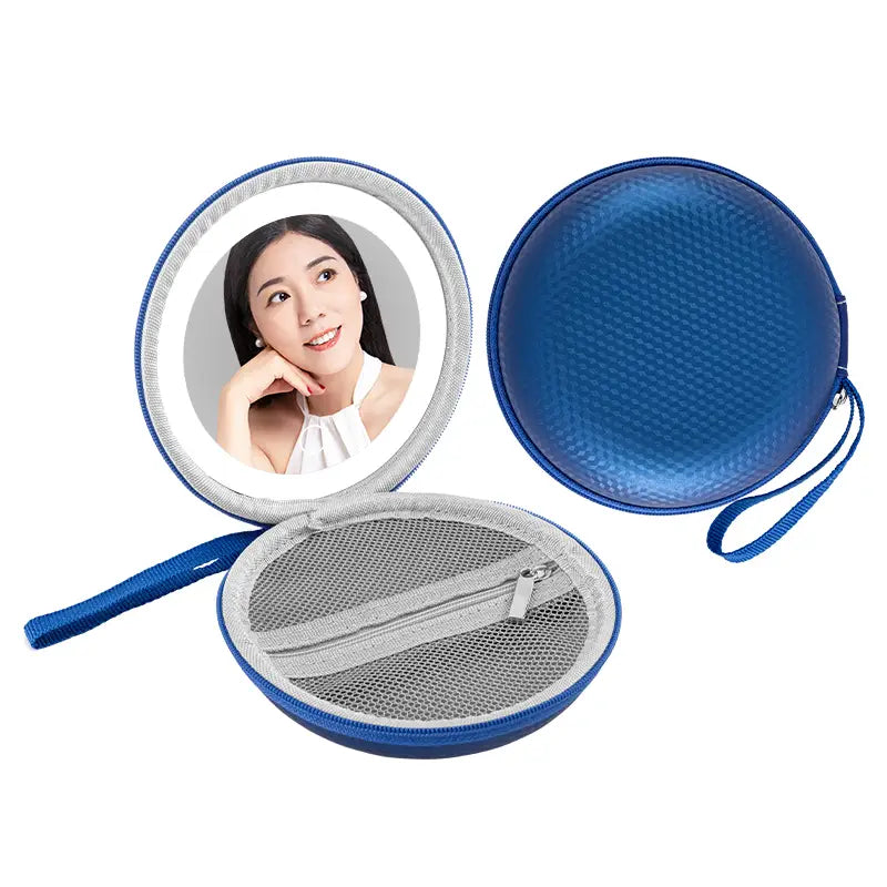 Blue and silver round bag blue travel case featuring a built-in mirror and mesh interior for organized storage.