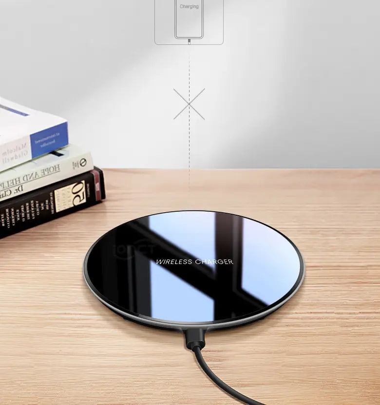 Black glossy 15w smooth wireless charger with a circular design and wireless charger printed in white on the surface.