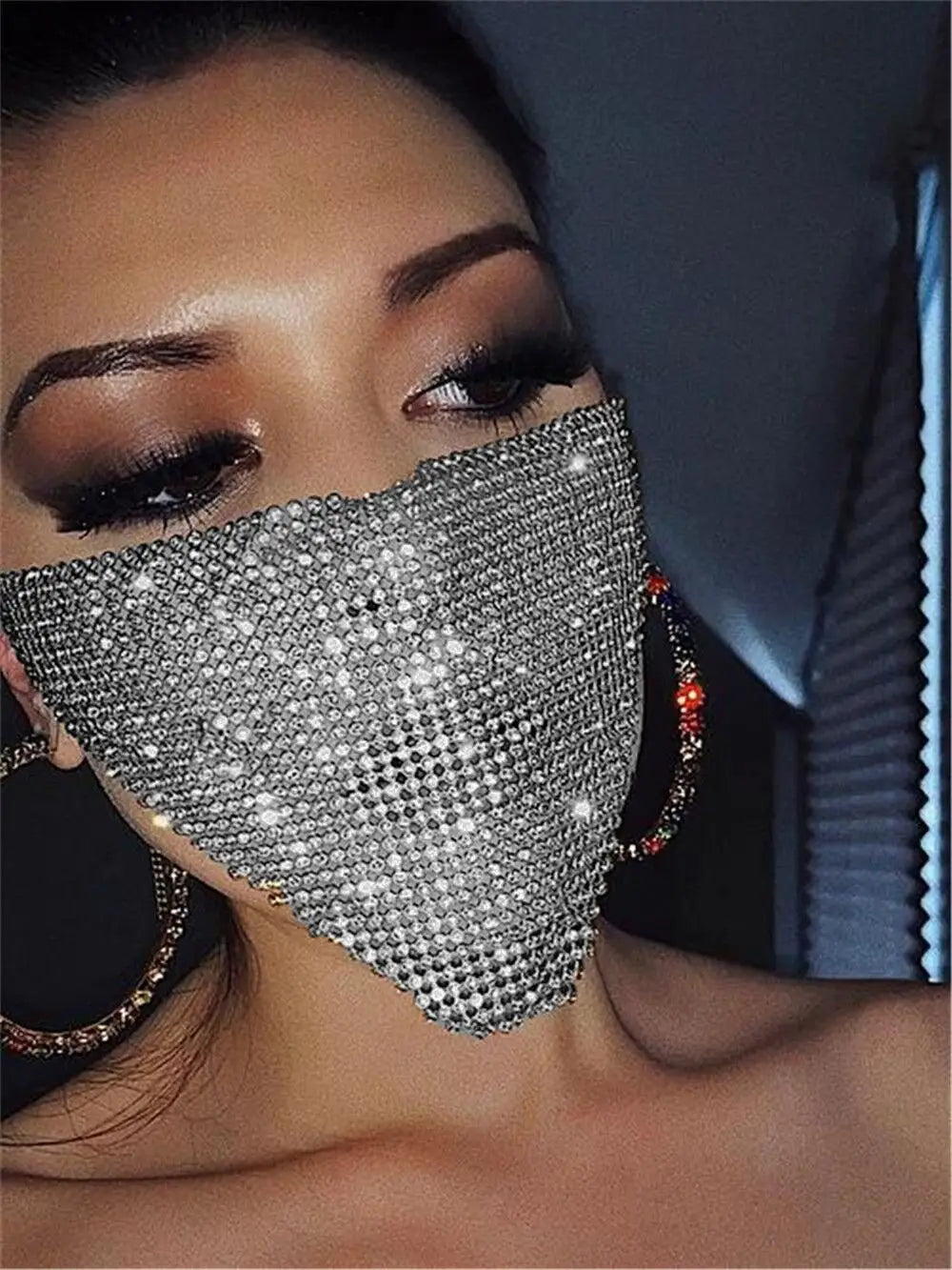 a sparkling silver rhinestone flash jewelry mask adorned with a dense glittering pattern of clear crystals showcasing explosive metal flash design.