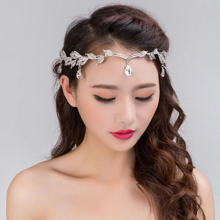 Silver leaf-patterned crown headband wedding headdress adorned with dangling crystal teardrops for elegant bridal wear.
