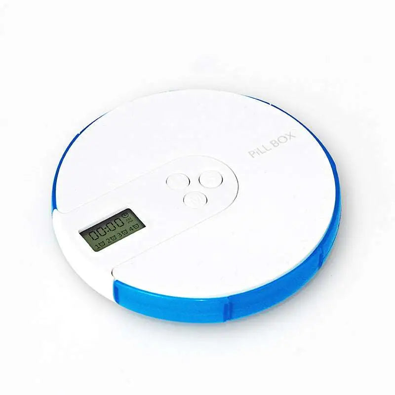 White and blue 7 compartment alarm clock pill box with digital display and labeled pill box on top surface