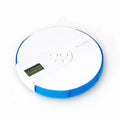 White and blue 7 compartment alarm clock pill box with digital display and labeled pill box on top surface