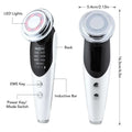 A sleek white and black 7-in-1 facial massager ems with chrome circular head featuring led lights for clean and eye care