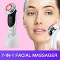 Silver and black 7-in-1 facial massager ems with red illuminated circular head and light vibration led technology