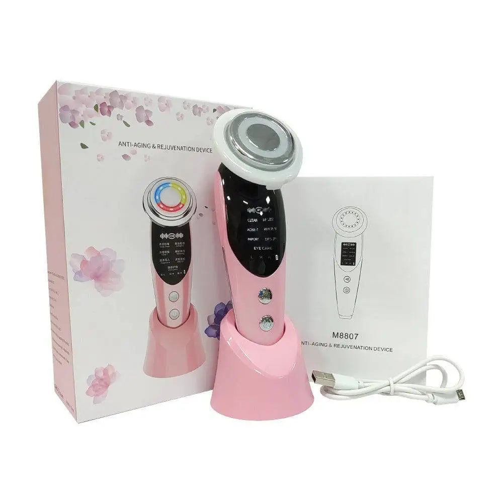 Pink m8807 7-in-1 facial massager ems with circular treatment head black control panel silver accents light vibration led