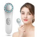 White 7 in 1 led facial machine and skin care massager with circular head featuring blue led lights around mirror surface