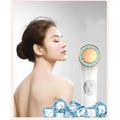 A sleek white and gold led facial machine with a circular head featuring turquoise lights for skin care massager use