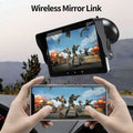 Black wireless carplay display with suction cup mount and cigarette lighter connection showing video game screen