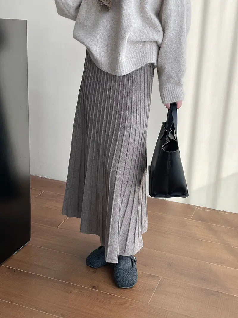 gray ribbed knit midi skirt featuring korean elastic waist with knitted pleated design for a stylish and comfortable fit