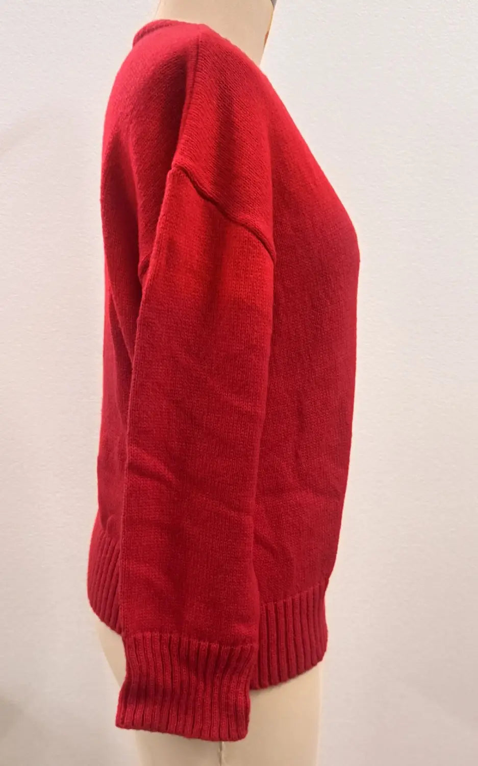 Red knit sweater featuring ribbed cuffs and hem in a christmas 3d floral contrast color crewneck design.