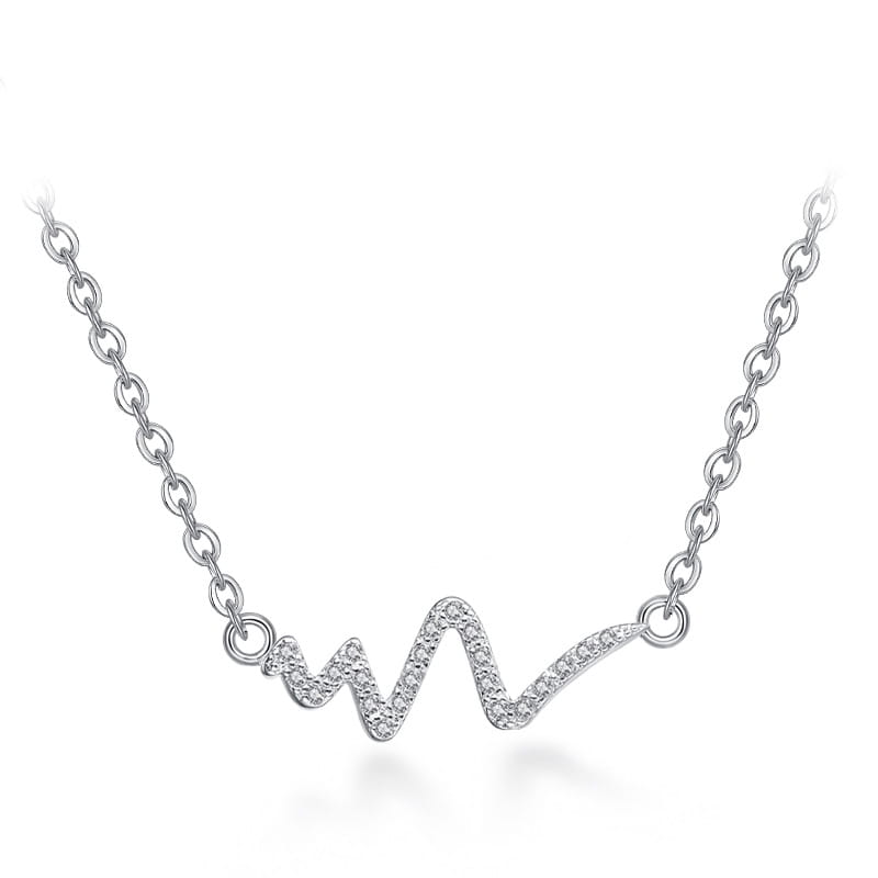 Silver necklace korean heartbeat featuring a delicate chain and a wave-shaped pendant adorned with sparkling clear stones, also known as necklace korean lightning or korean lightning necklace.