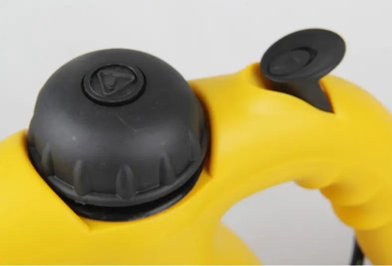yellow and black handheld steam cleaner with a flexible nozzle featuring a black textured cap and a smaller knob on the handle, ideal for use in color box packaging and luxury women’s fashion settings.
