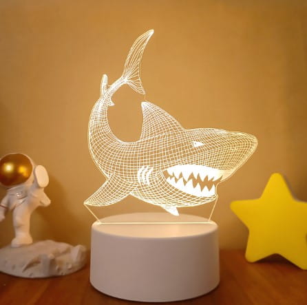 White acrylic shark-shaped 3d led night light with glowing wireframe design featuring colorful touch remote control lights for adjustable ambiance.