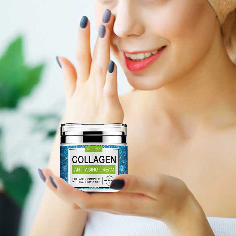 A sleek silver-lidded jar of envisia retinol cream collagen anti-aging cream featuring a blue patterned label with green accents.
